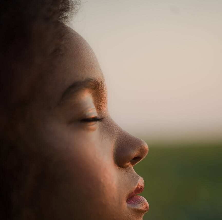 profile of a woman with closed eyes